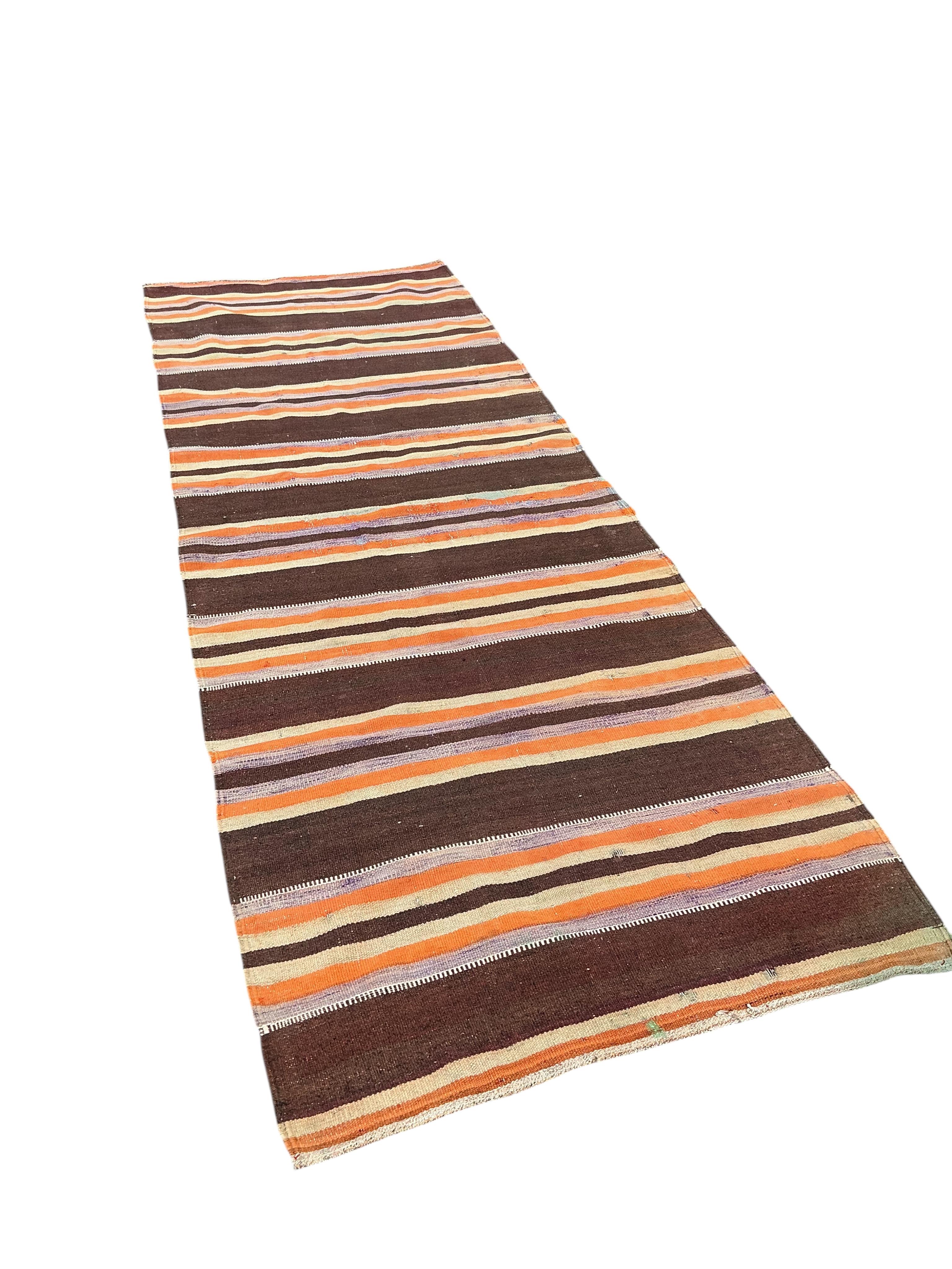 A Turkish kilim hall carpet, 340 x 120cm